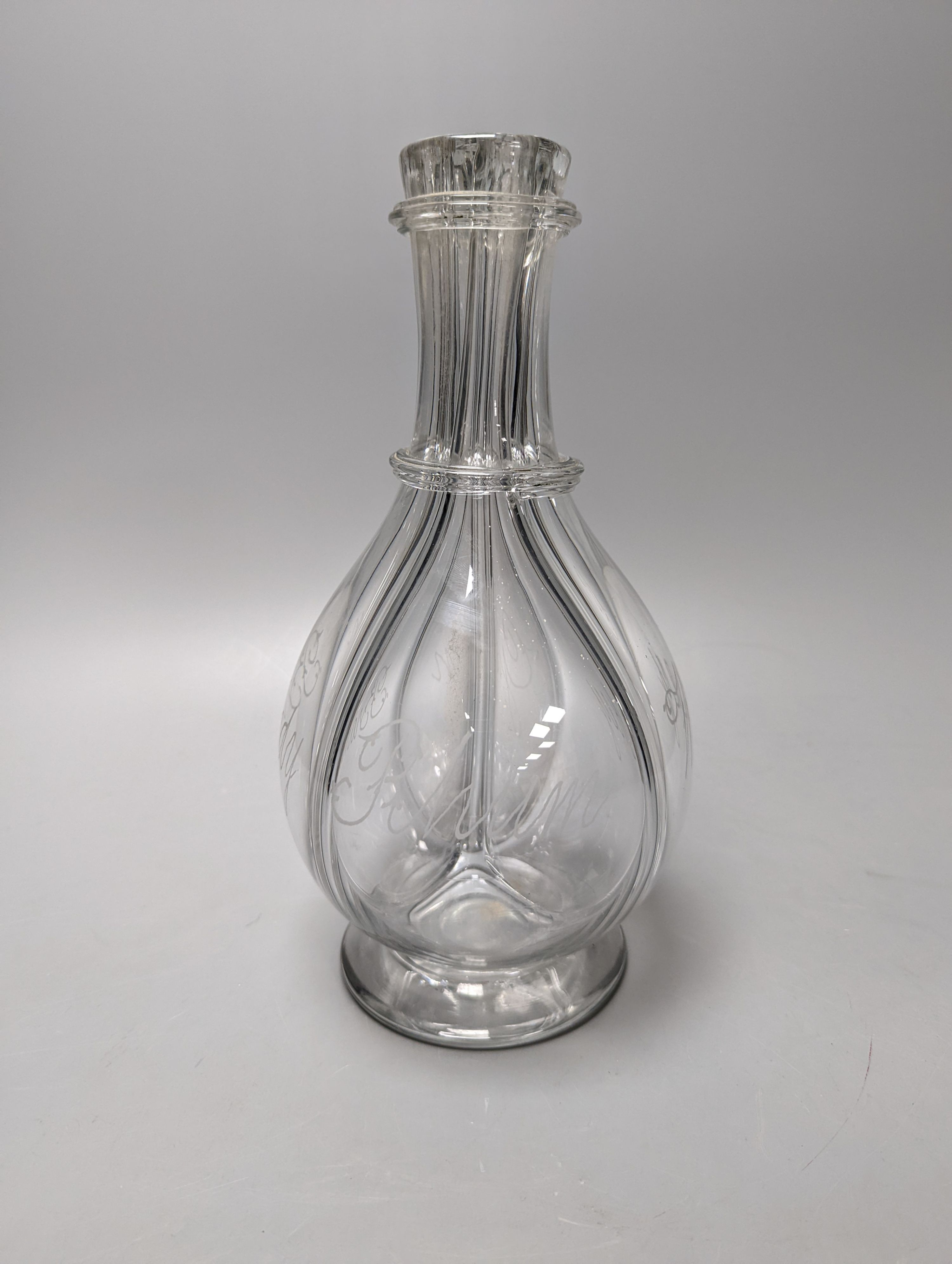 A Dutch? glass four compartmented spirit bottle, engraved with Rhum, Wiskey, Gin and Brandy 26cm